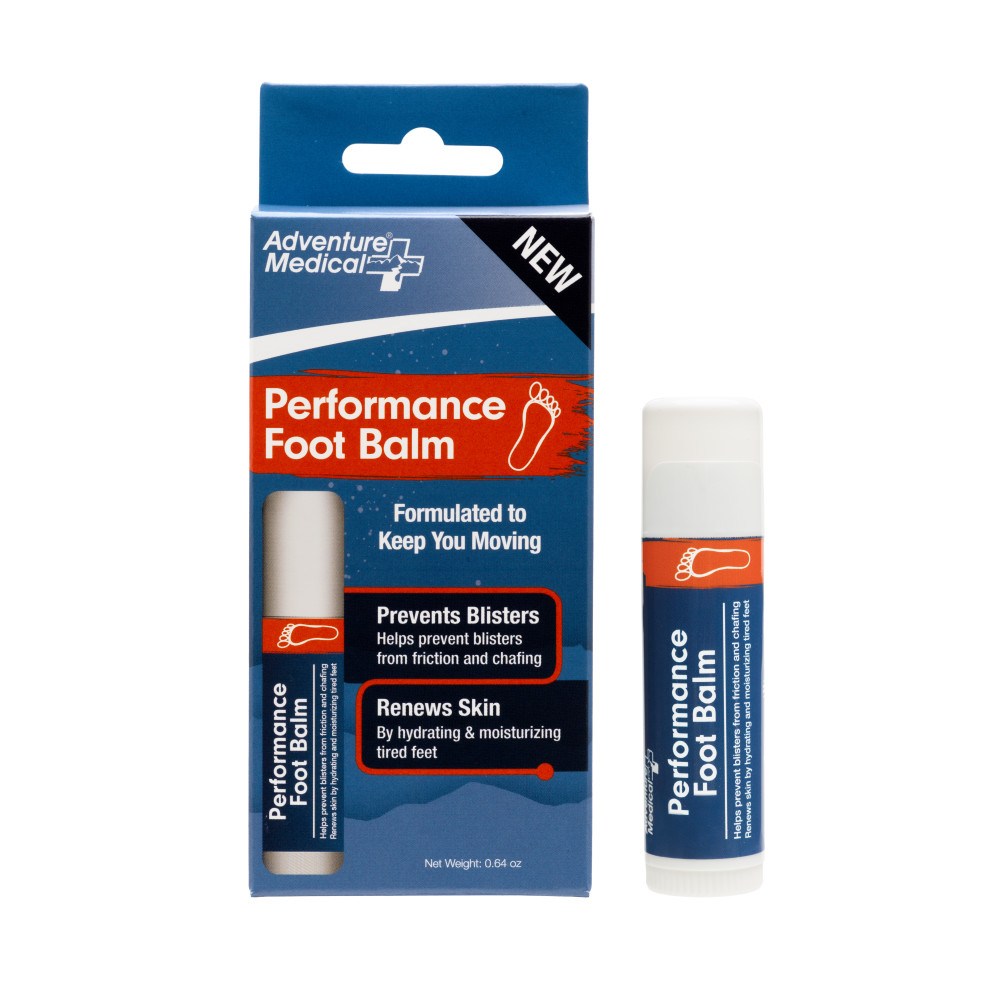 box of performance foot balm with stick of the product next to it