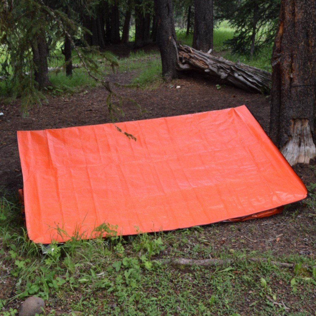 All Season Blanket blanket being used as a shelter