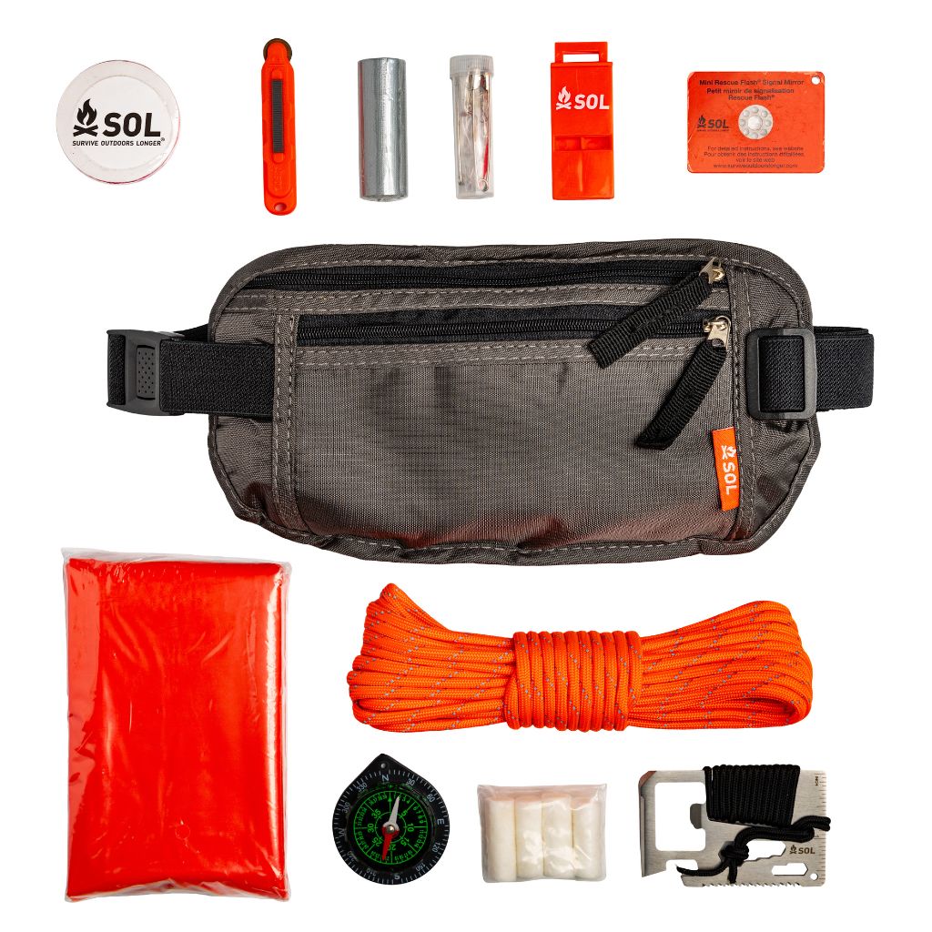 Trail Ready Survival Kit contents displayed next to hip bag