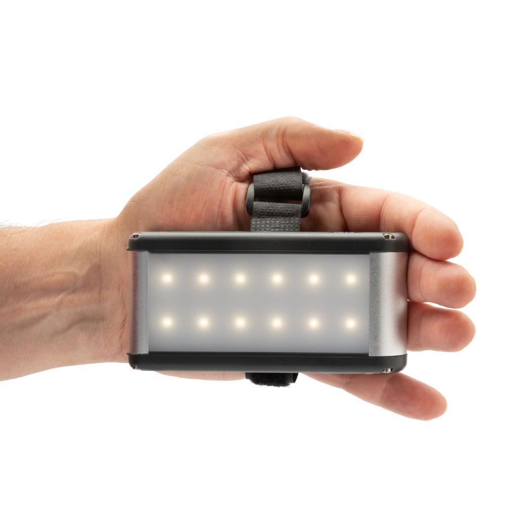 Venture Light 2600 Recharge with Power Bank lit up in hand