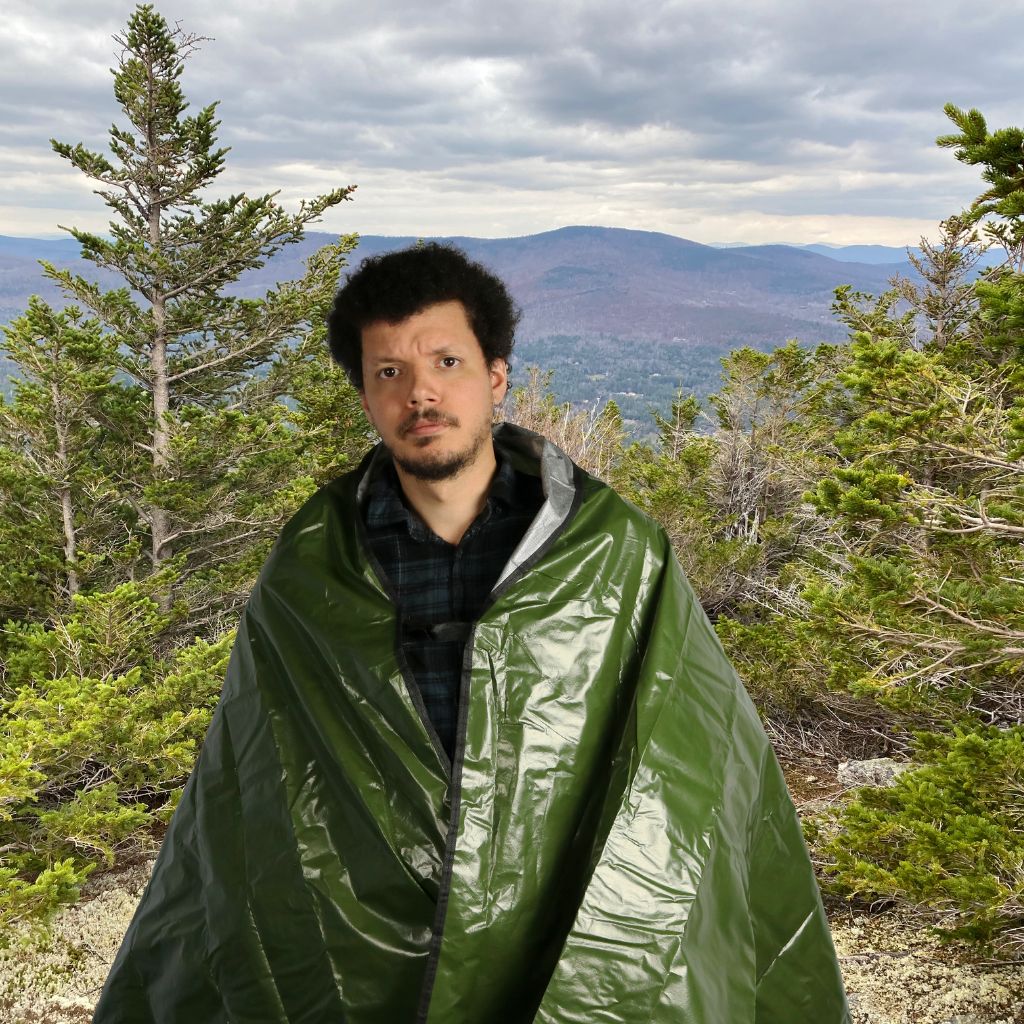 Sport Utility Blanket man on summit in blanket