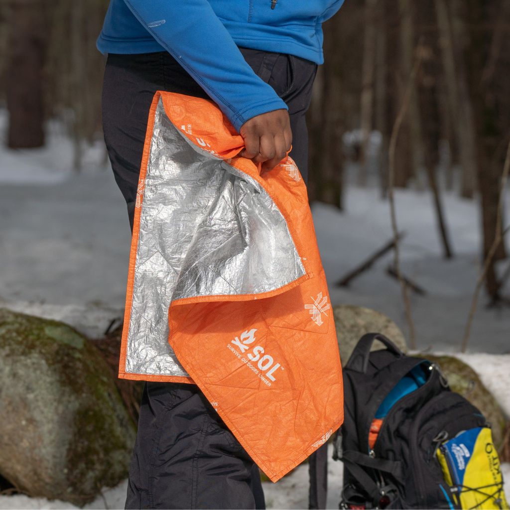 Escape Insulated Trail Seat person holding