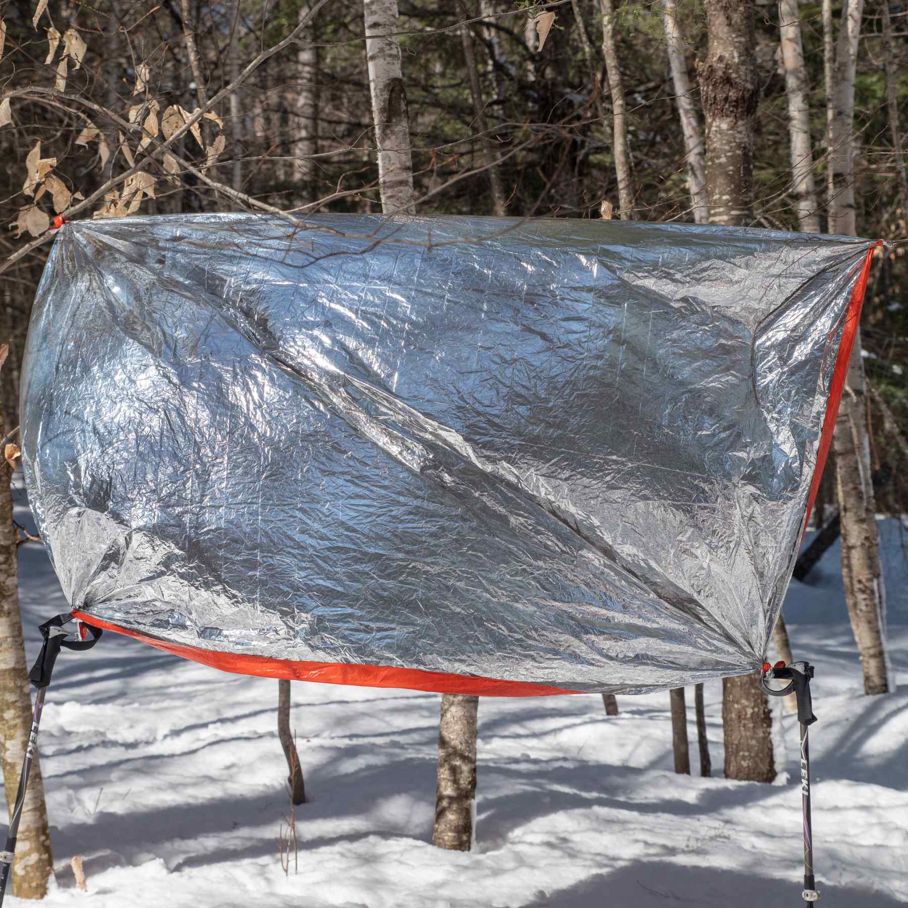 Emergency Blanket inside out used as a shelter