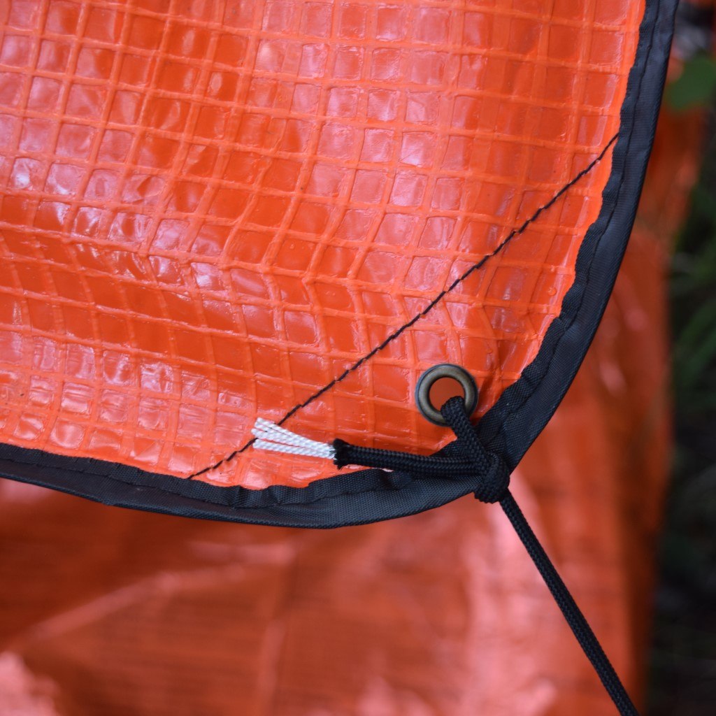 All Season Blanket close up of corner grommet tied with string