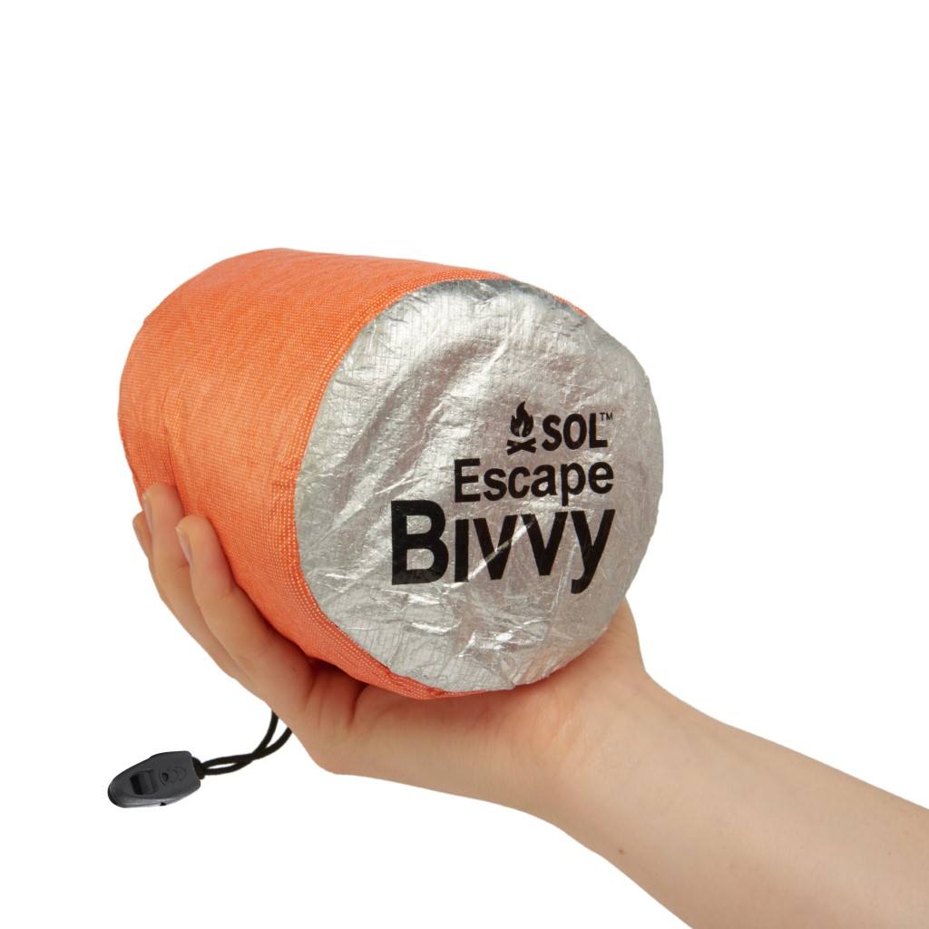 Escape Bivvy Orange holding in hand
