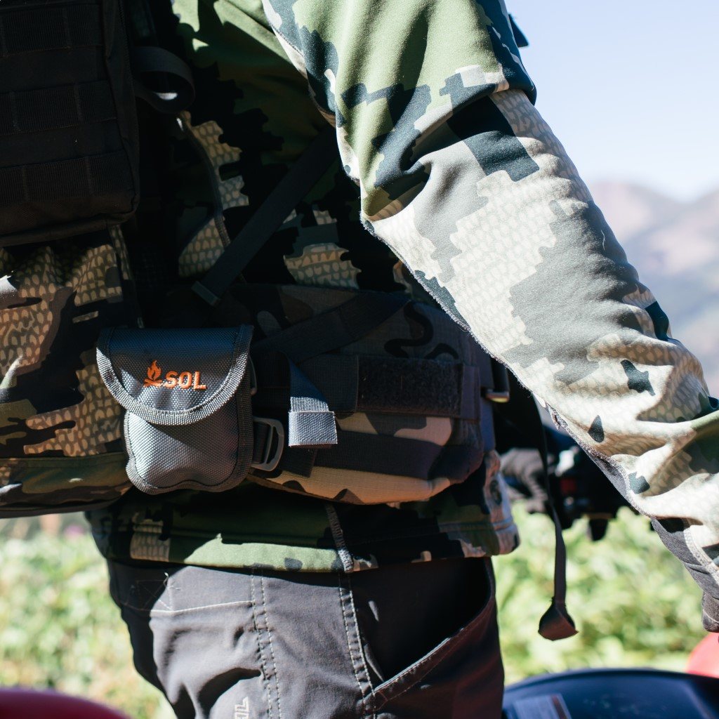 Pocket Chainsaw in pouch on man on ATV
