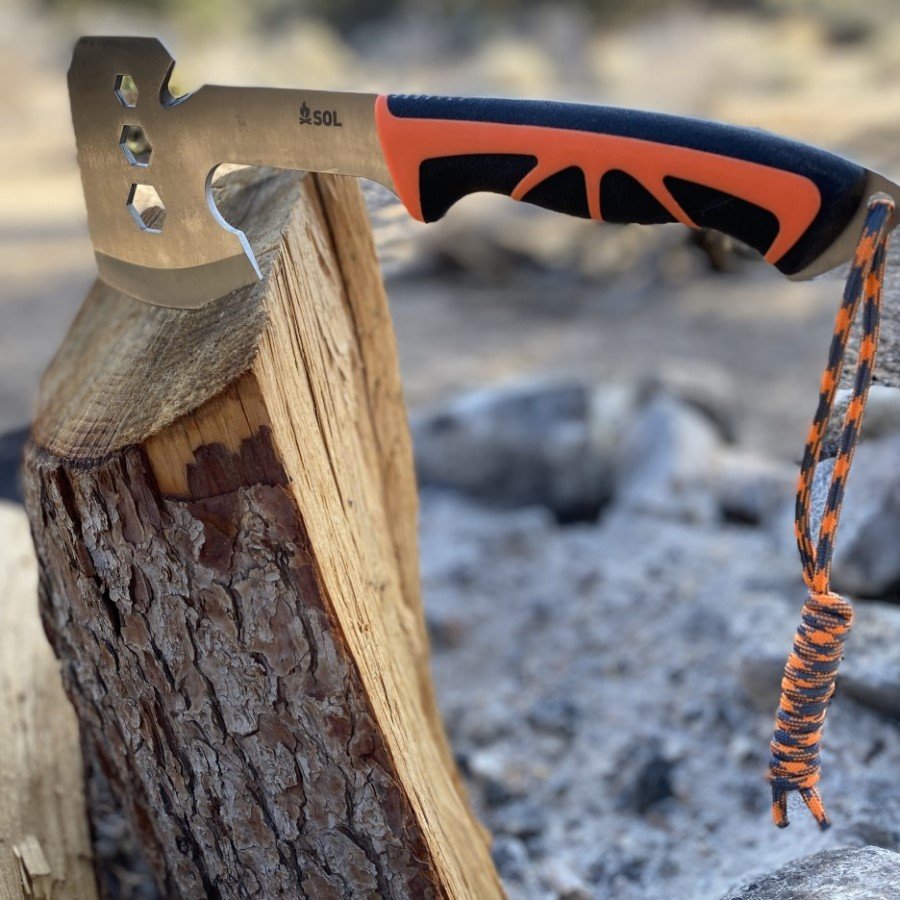 Stoke Camp Hatchet stuck in cut wood