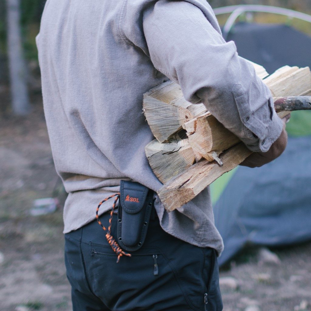 Stoke Folding Knife in holster on hip on belt