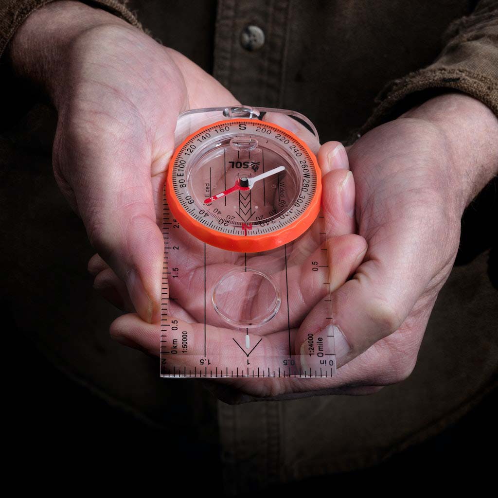 Deluxe Map Compass in hand