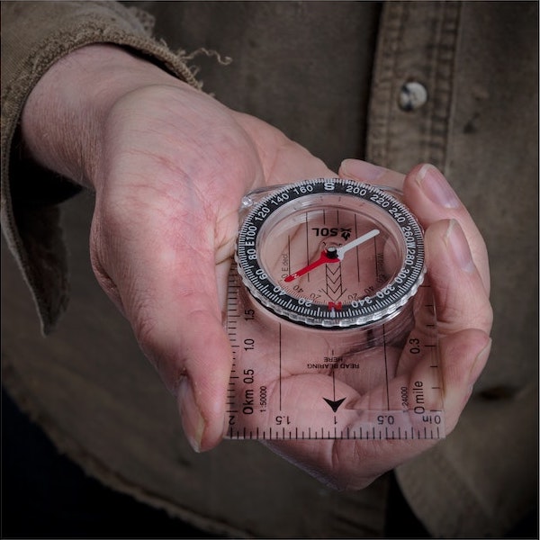 Map Compass holding in front